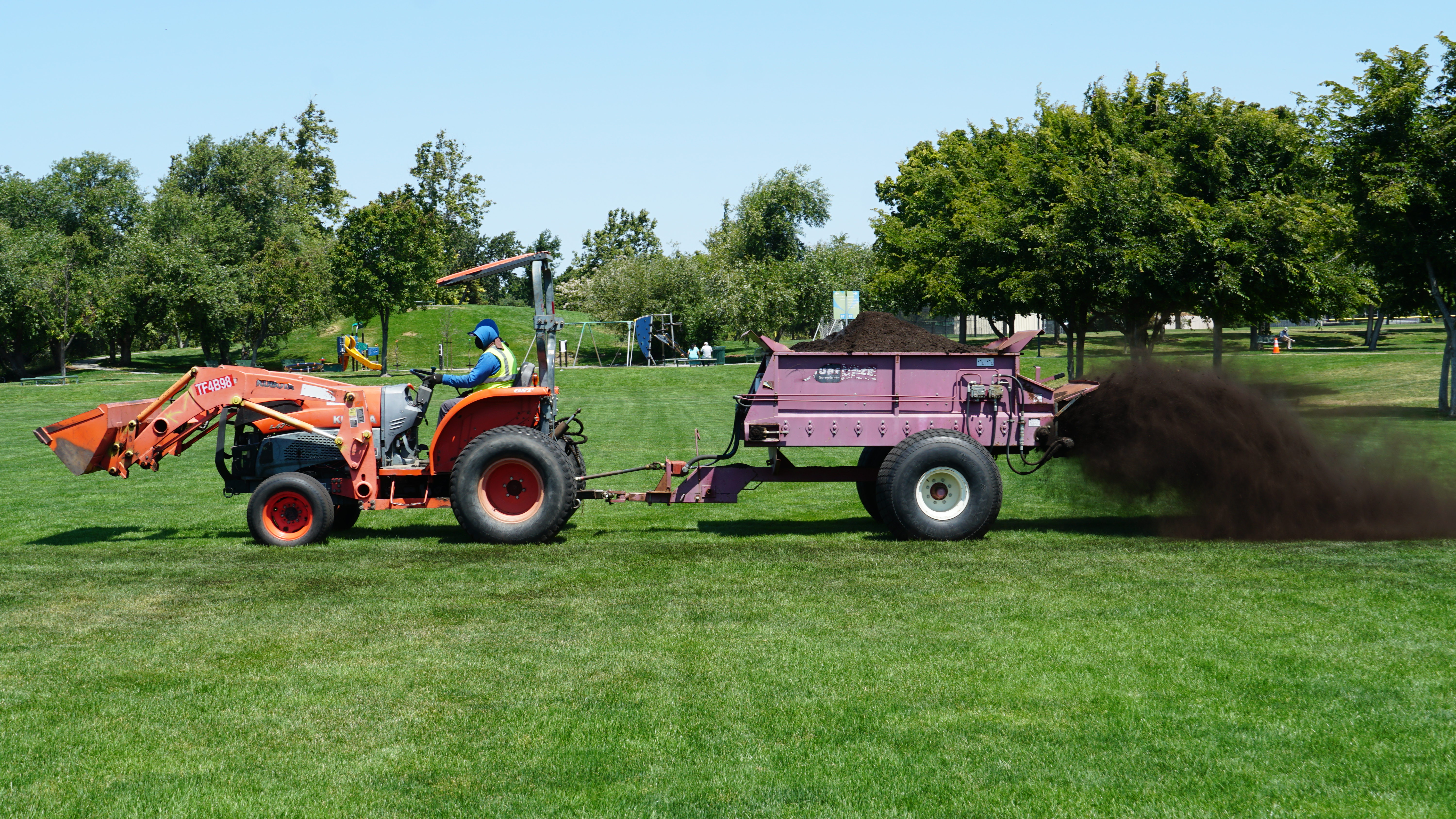 Tractor Spreading Compost