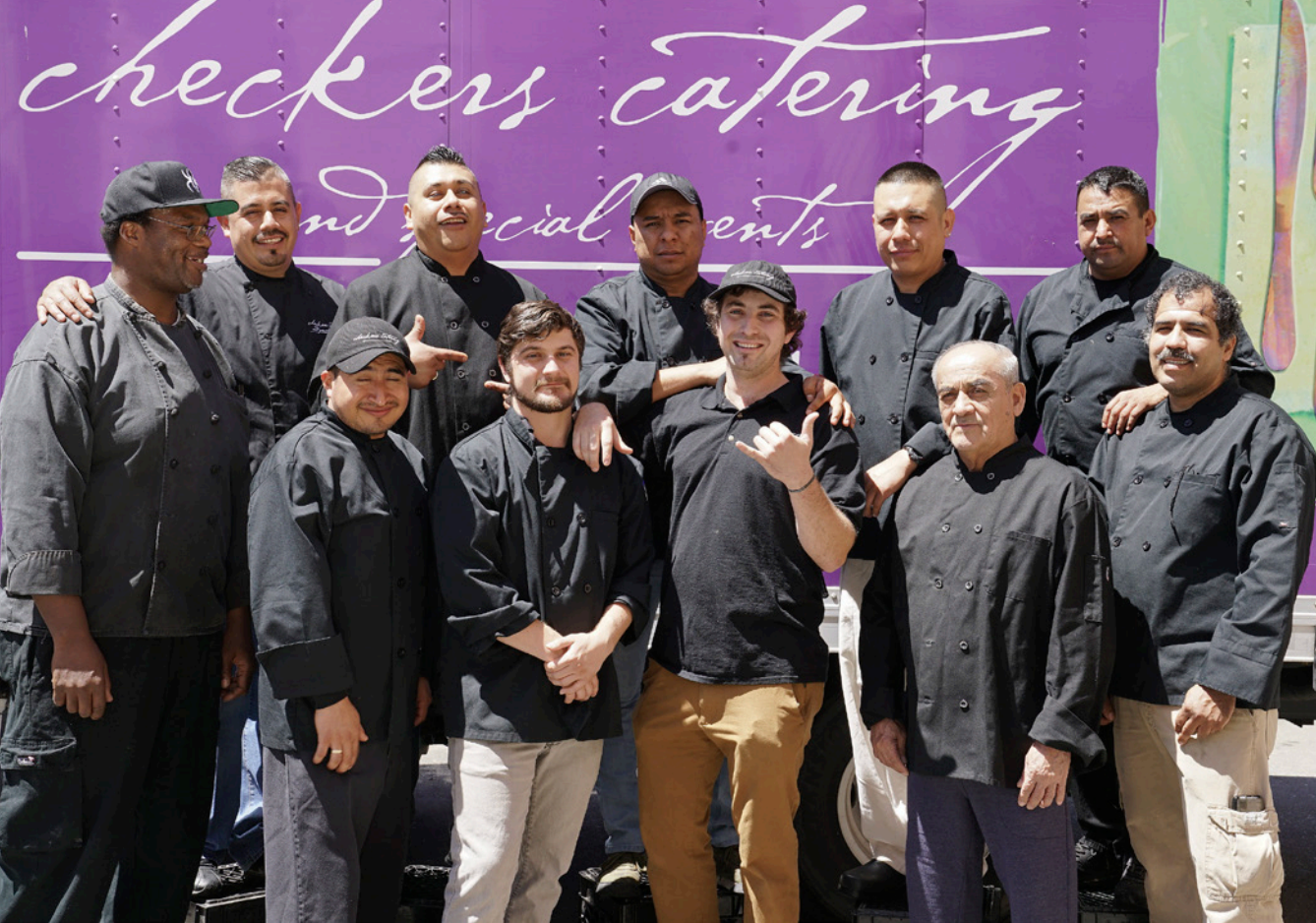 employees posing for staff photo