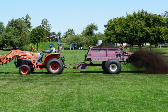Tractor Spreading Compost