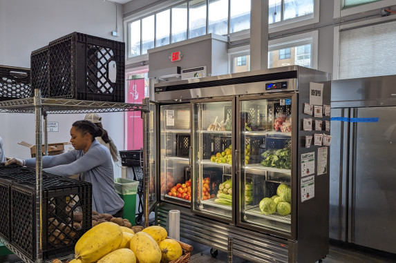 Refrigerators holding surplus edible food