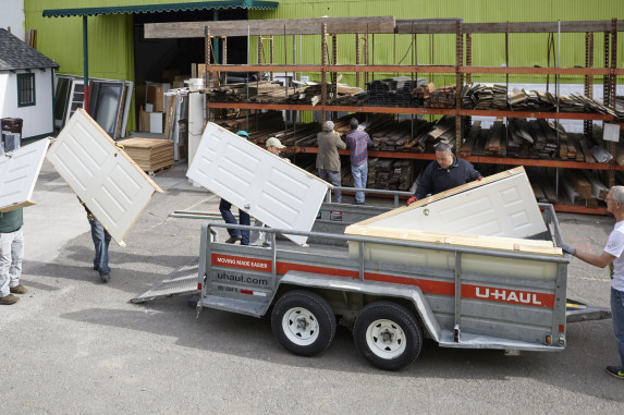 Doors being loaded onto U-Haul