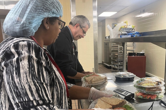 weighing food for donation